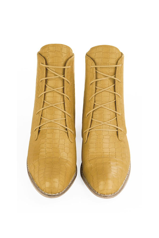 Mustard yellow women's ankle boots with laces at the front. Round toe. Low leather soles. Top view - Florence KOOIJMAN